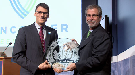 Mayor Gregor receiving the LEED Platinum plaque for the 2010 Vancouver Olympic Village, via CTV
