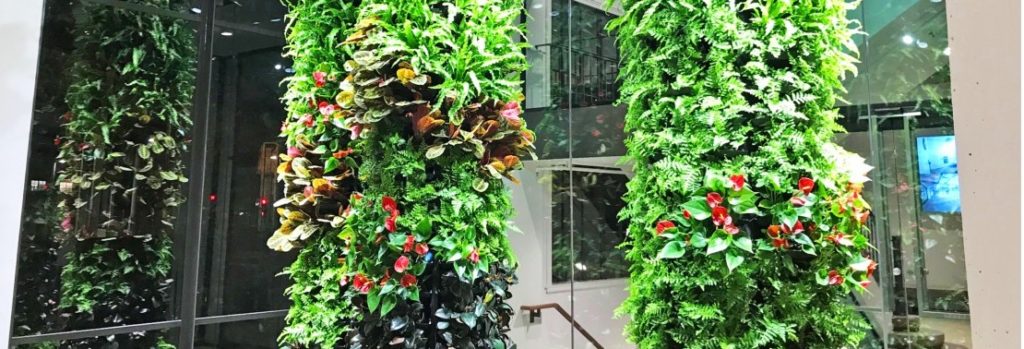 The 9 Benefits of Business Buildings With Vertical Green Walls
